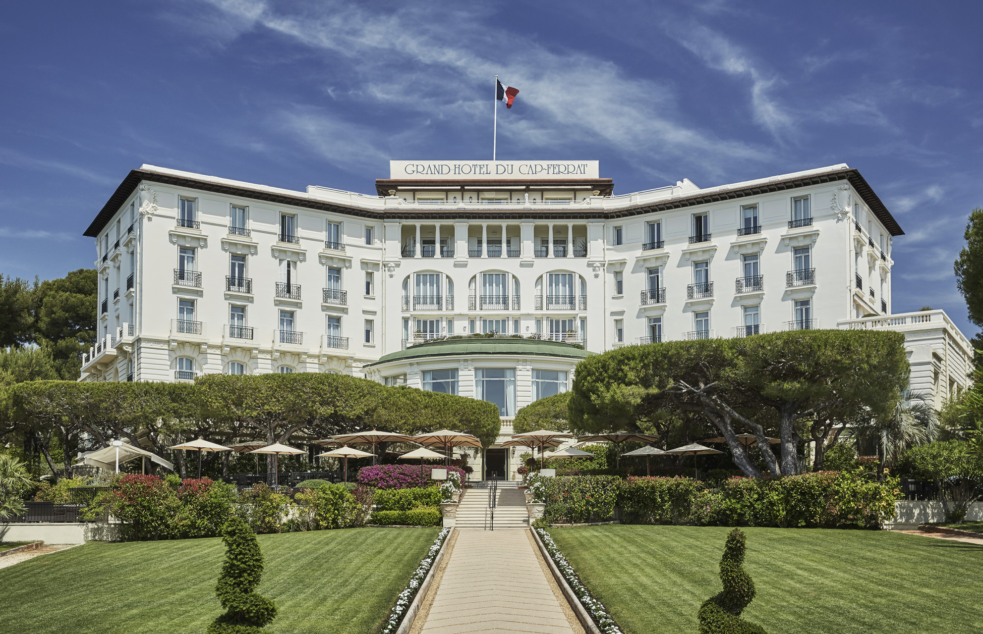 The stunning facade of the Grand-Hotel du Cap-Ferrat, a Four Seasons Hotel.