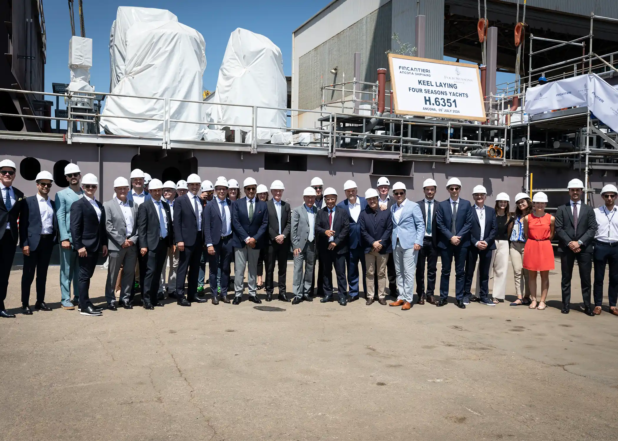 The proud Four Seasons Yachts team gathers at the ceremony.