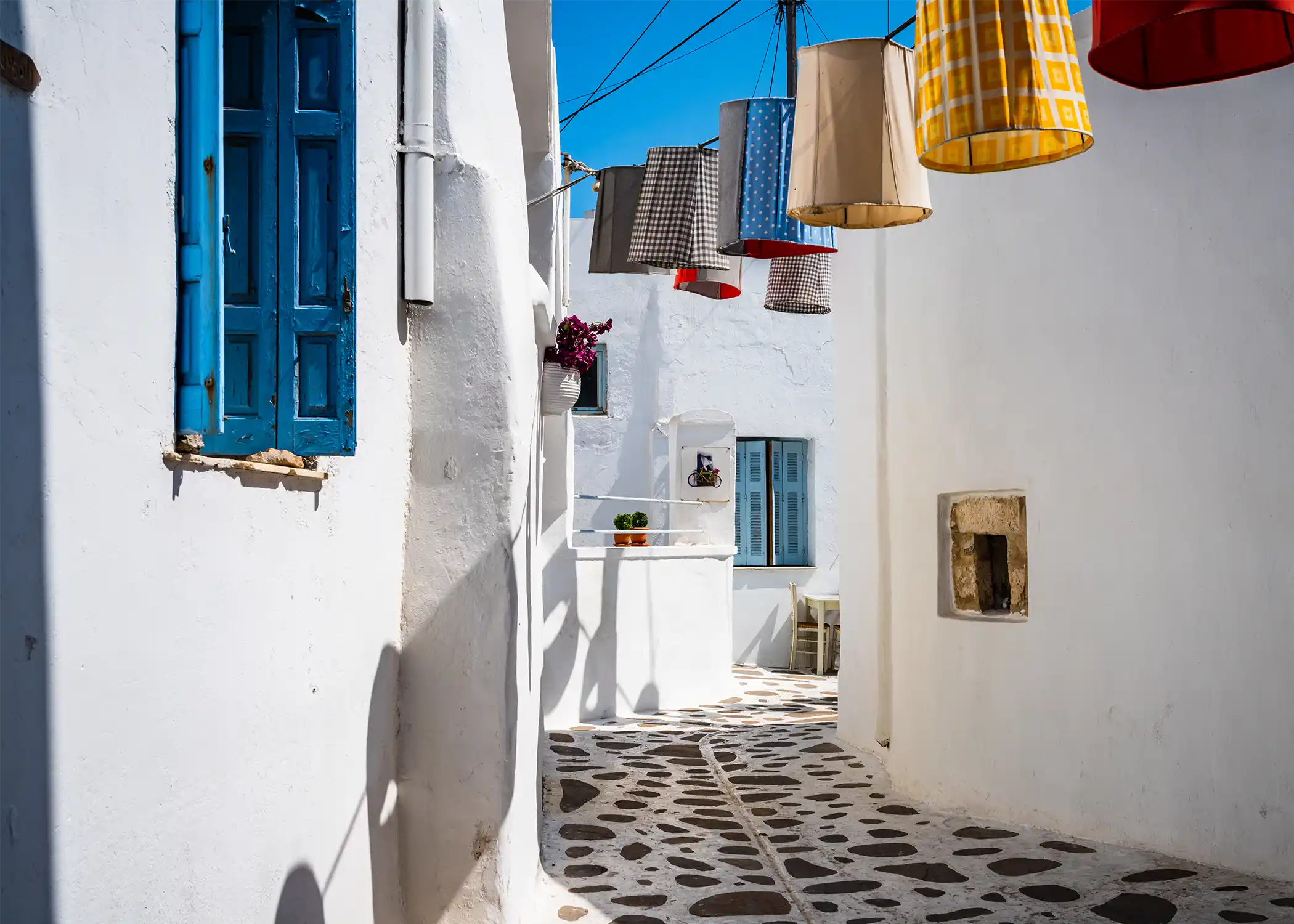 A street with colorful lanterns in Naxos Island Greece.