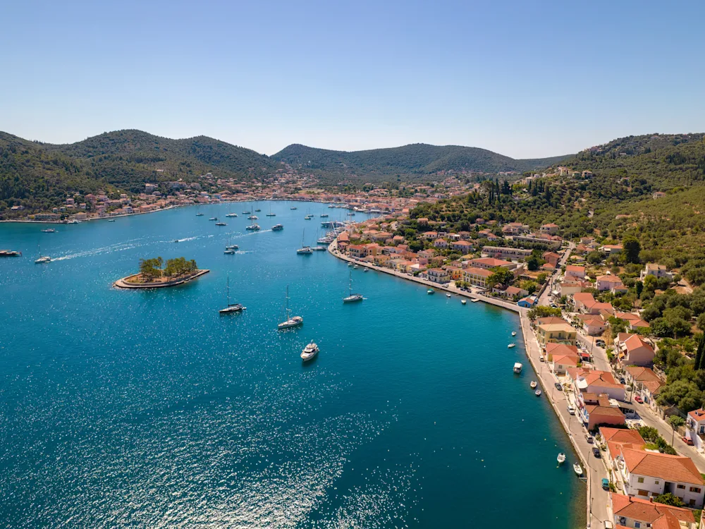 A Greek island harbour with boats at anchor