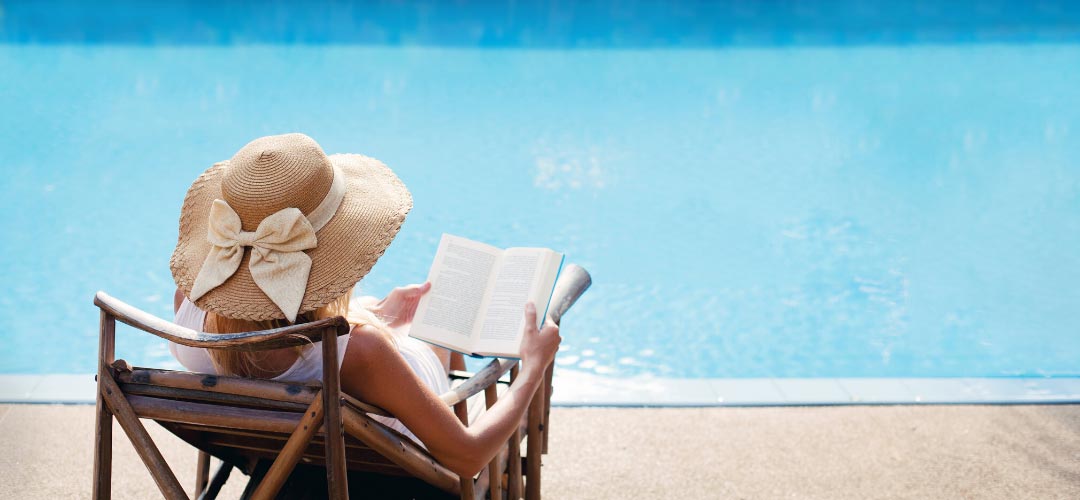 woman-reading-poolside