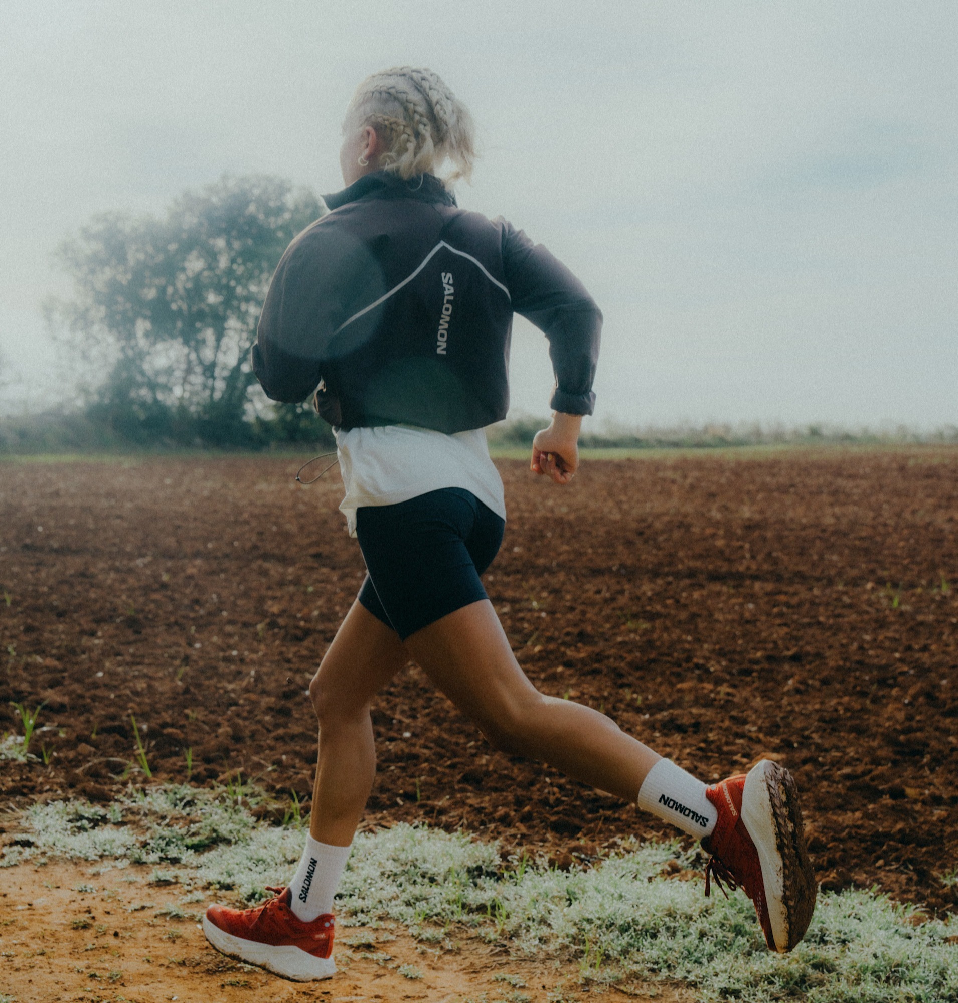 woman running with gravel shoes