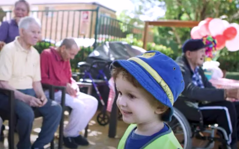 Playgroup of kids visit residents at Bupa Ashfield aged care home