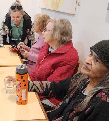 Residents from Bupa Enfield eagerly wait for their regular cat visit