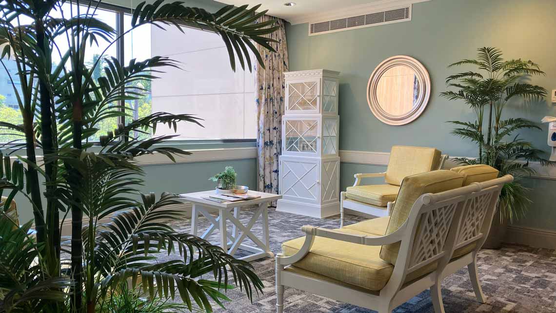 Bupa St Ives palm sitting area