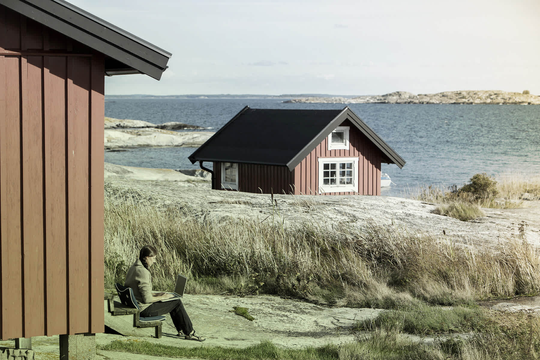 Woman with computer on Archipelago