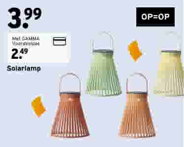 Vier solarlampjes in groen, geel en oranje tinten met een handvat, geprijsd op €3,99, op=op aanbieding.