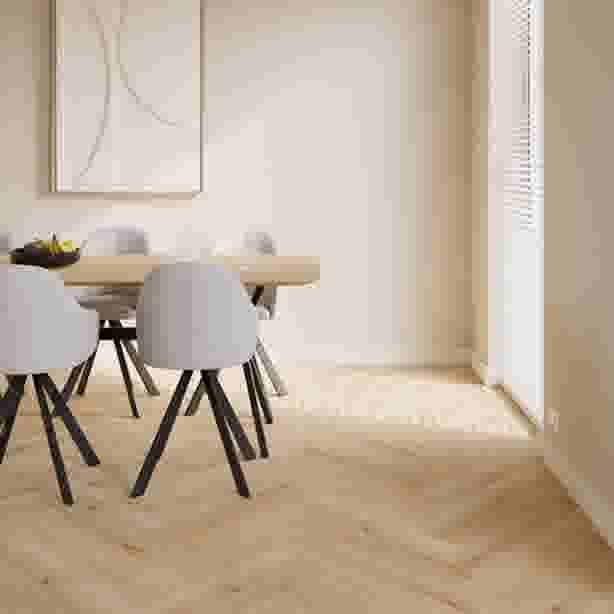 Elan vloer in visgraatpatroon in een lichte, moderne eetkamer.