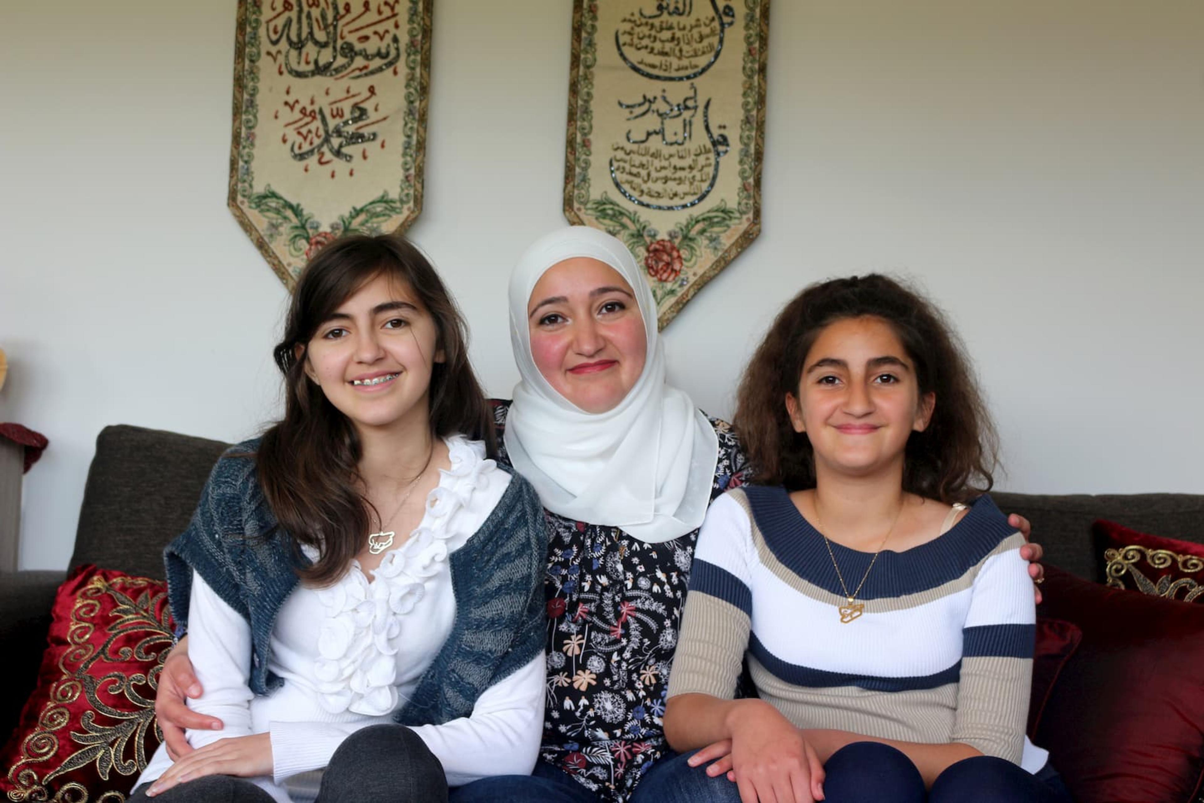 Batool Nakshbandi (14), Ramia Saidawi, and Bayan Nakshbandi (12) (From left to right)