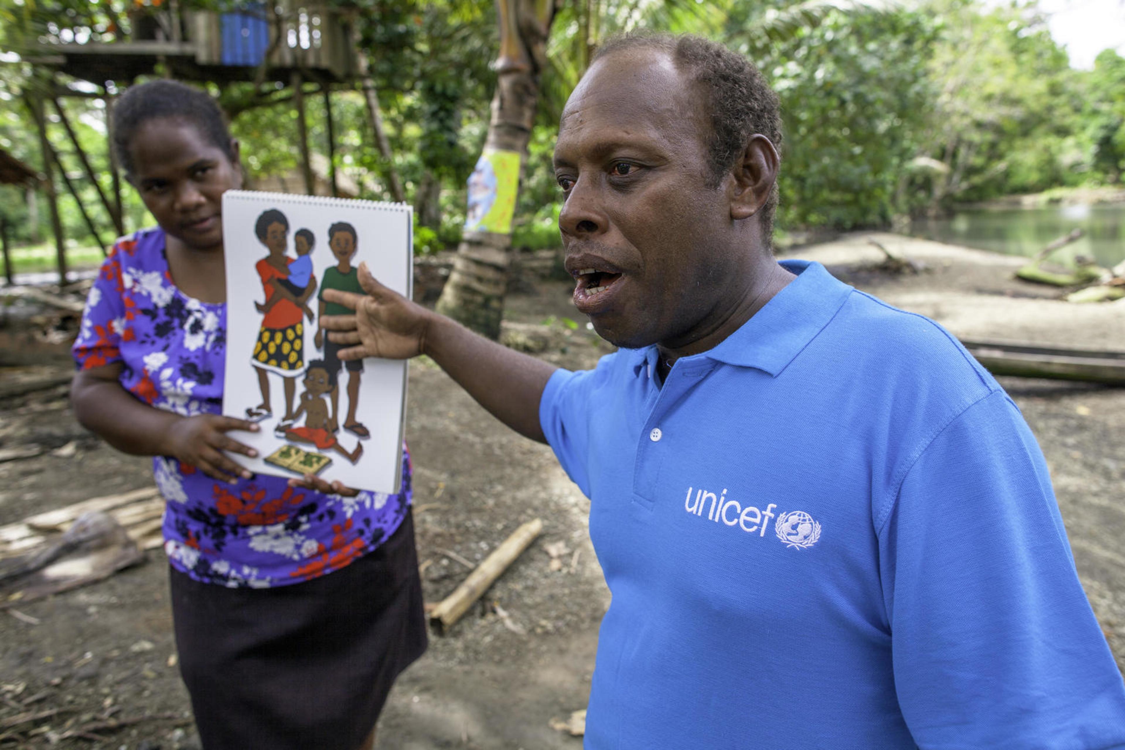UNICEF Health Worker Paul Maesiala advises mothers and educates families on the importance of a nutritious diet