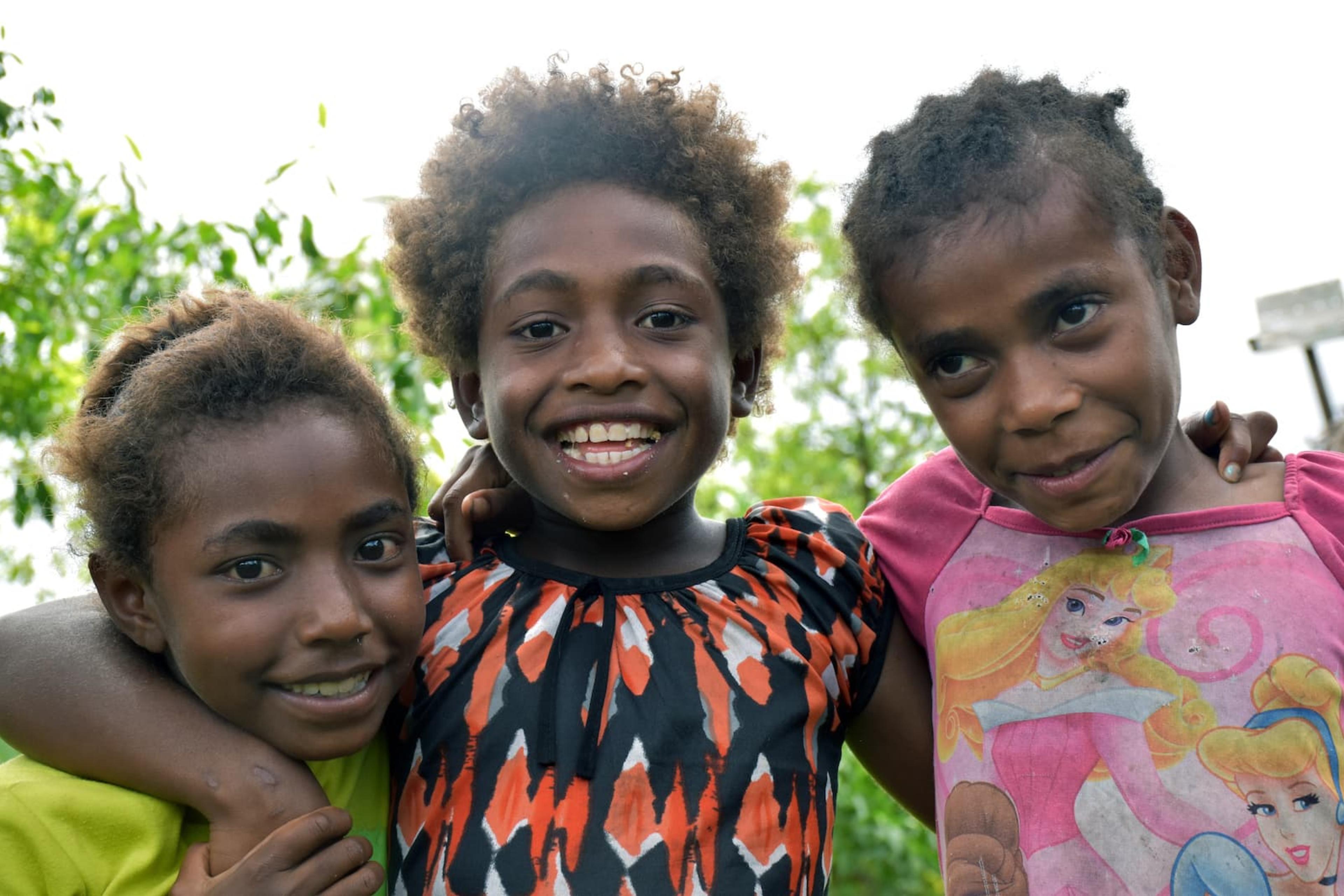 Nowo, Nalam and Angela benefit from the water project in Vanuatu