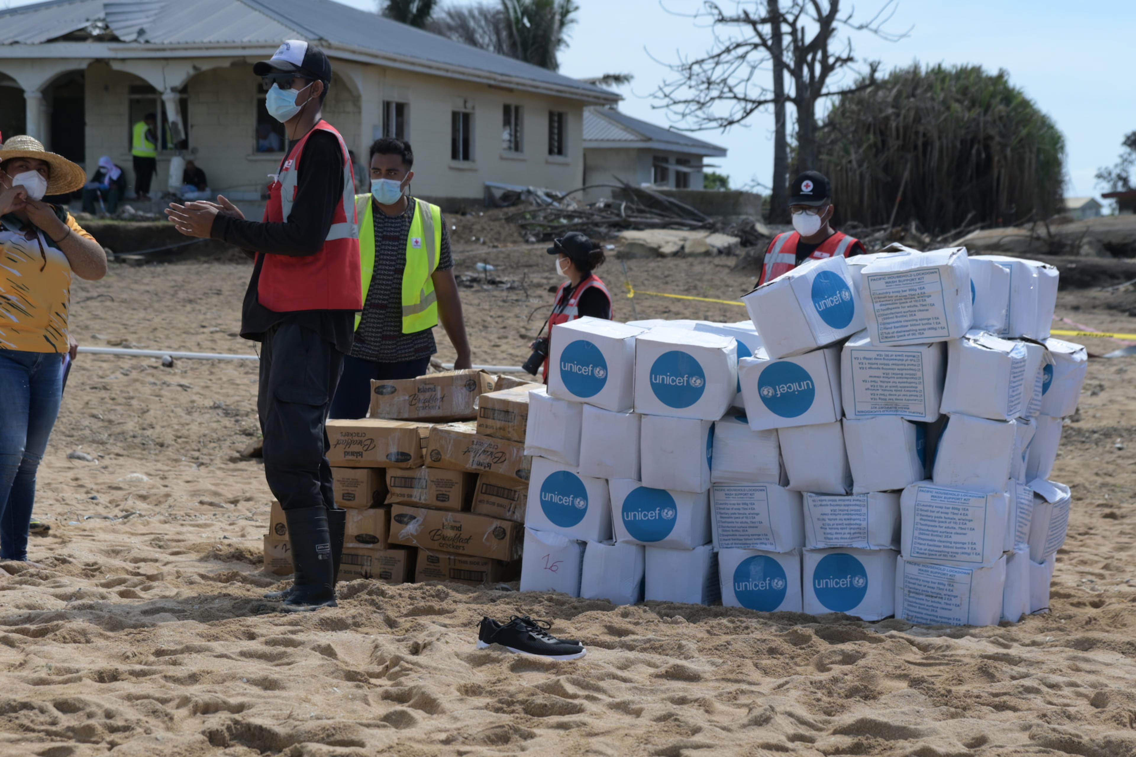 Amid COVID-19 restrictions in Tonga, supplies from UNICEF have been delivered to a beach on Nomuka Island through the Red Cross. © Tonga Red Cross Society 2022