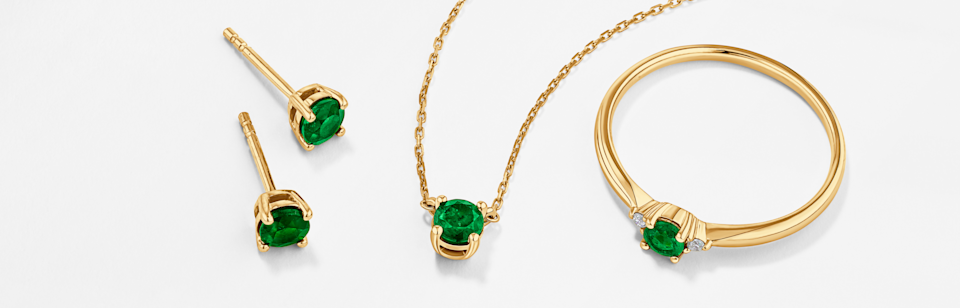 may birthstone emerald earrings necklace ring in yellow gold