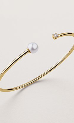 gold bangle with pearl and diamond