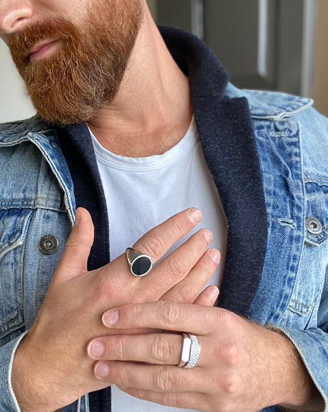 Man wearing three rings
