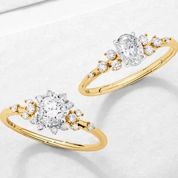 two yellow gold diamond scatter engagement rings
