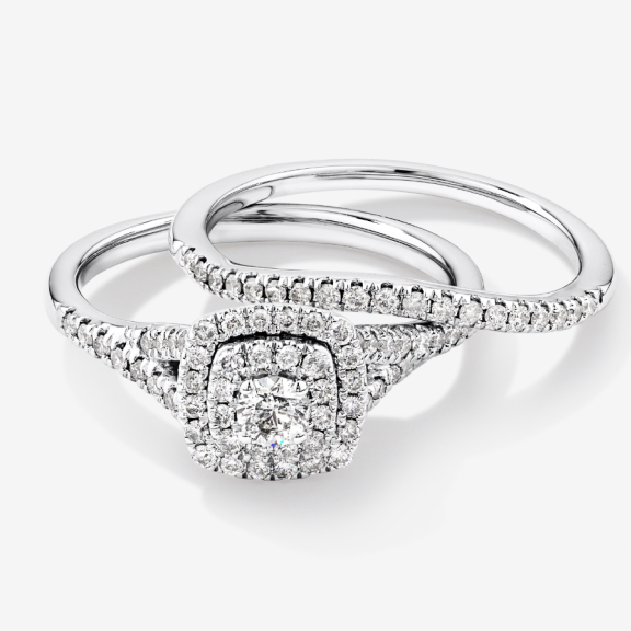 white gold double halo engagement ring with oval center stone