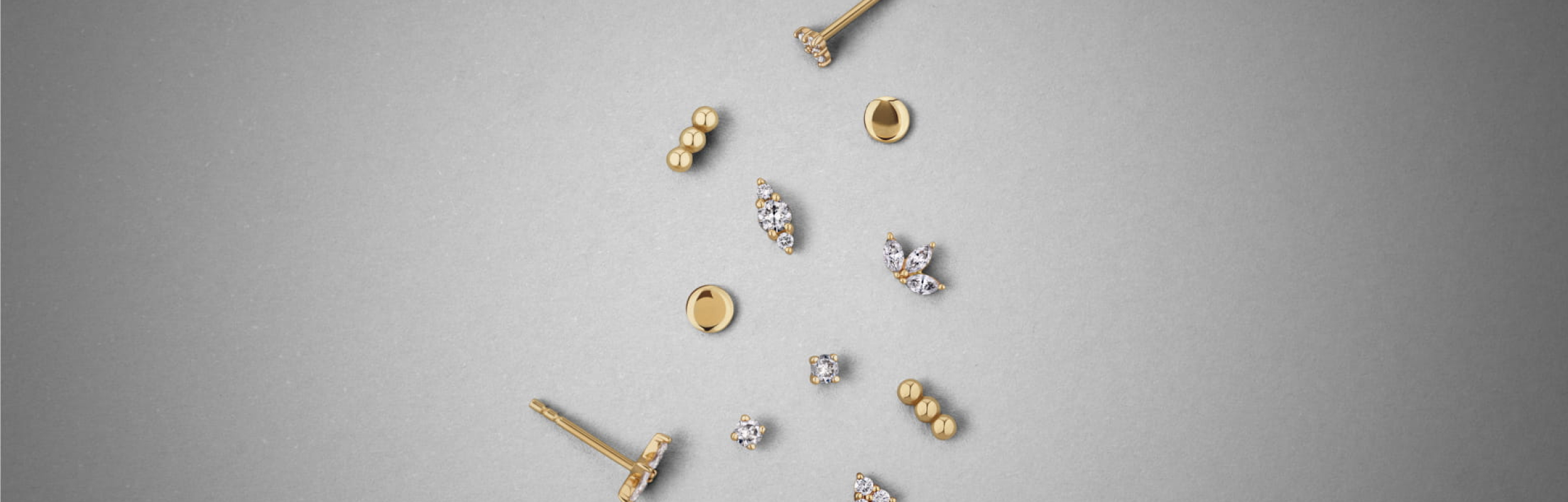 gold minimalist dainty earrings, studs and diamonds