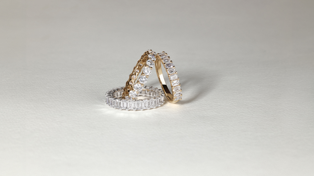 Wedding bands flatlay yellow gold and white gold with diamonds