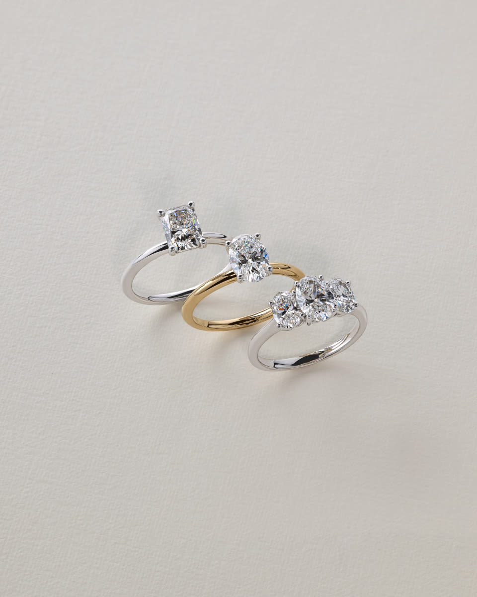 emerald and oval diamond shape engagement rings
