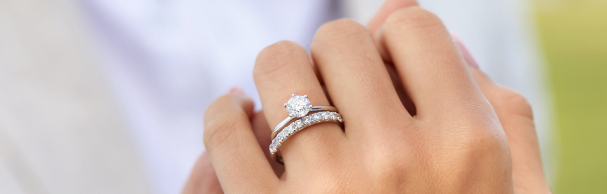 Hand with diamond bridal set