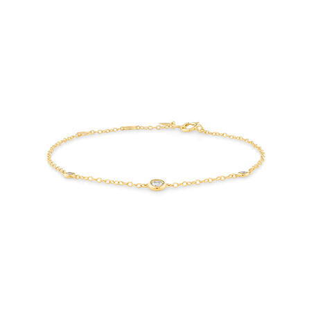 Yellow Gold dainty bracelet with three small diamonds