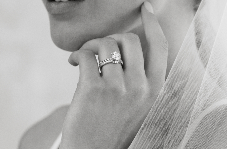 Bride wearing diamond wedding rings