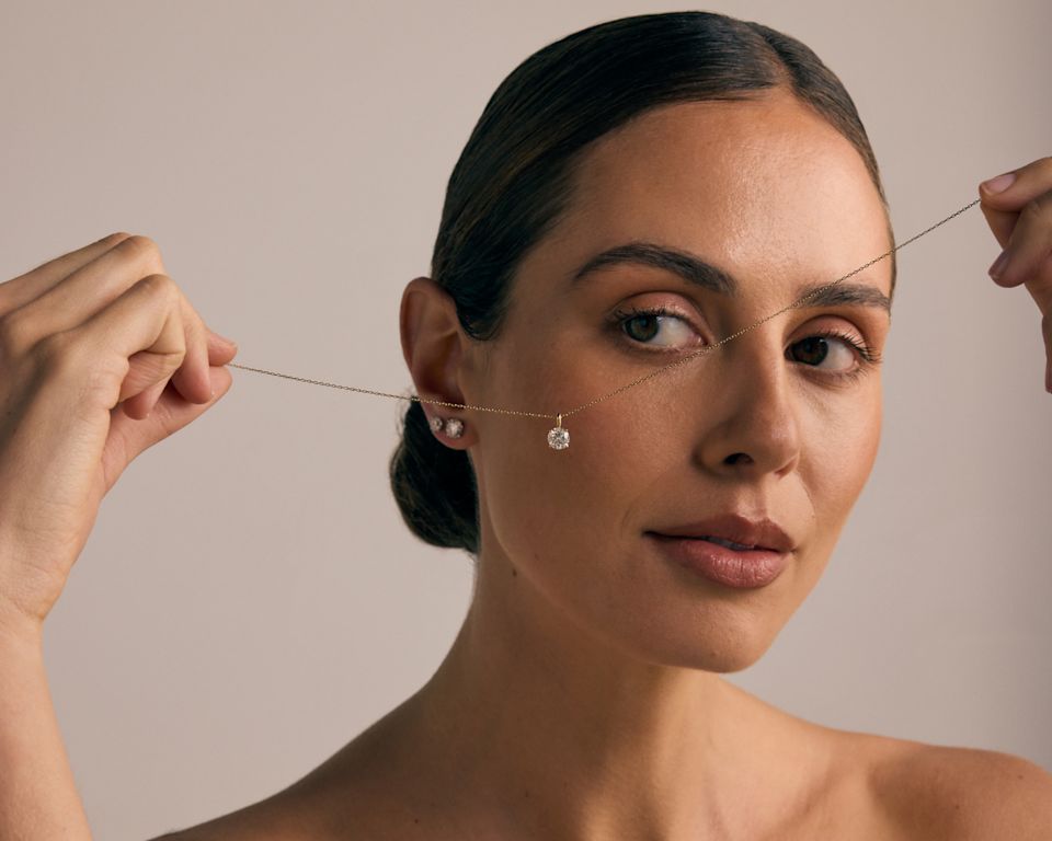 woman wearing signature diamond jewellery