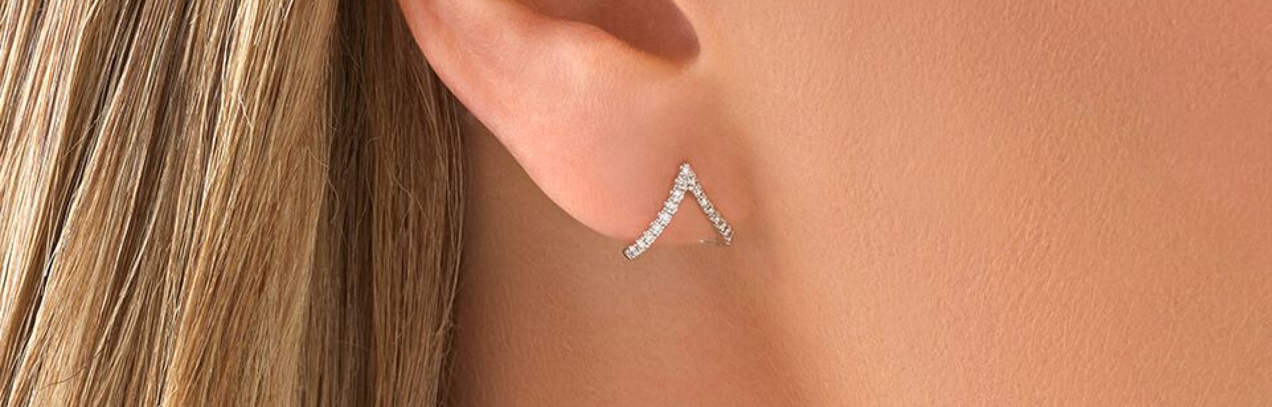 chevron sterling silver stud earring in ear