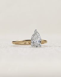 pear cut diamond solitaire engagement ring in yellow gold