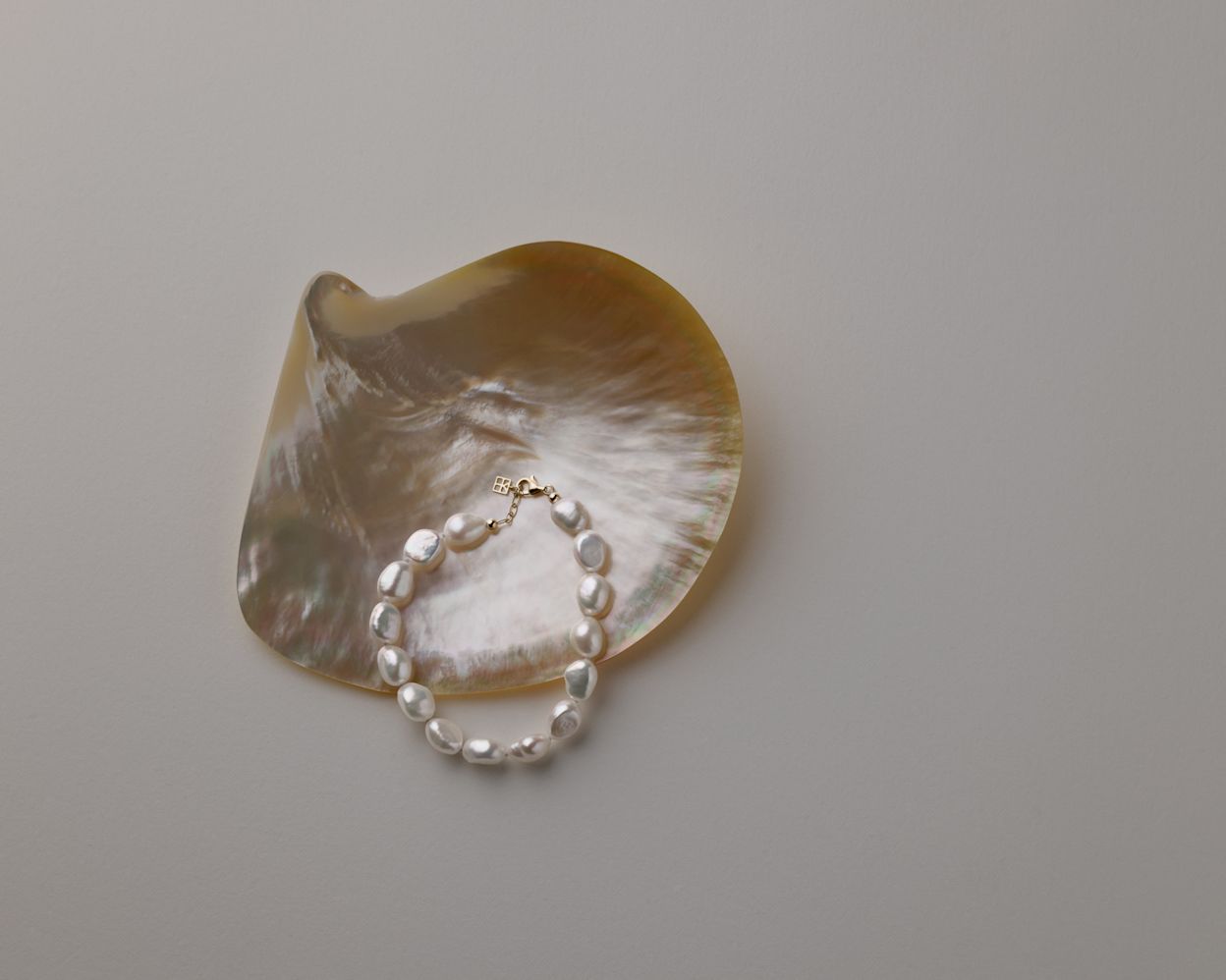 Flat lay of pearl bracelet