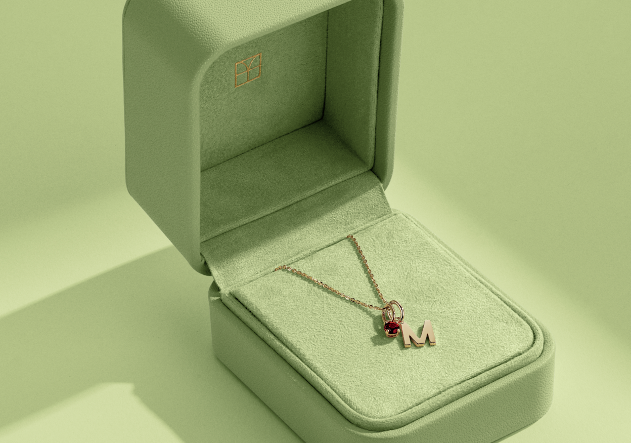 Charms on chain in a box
