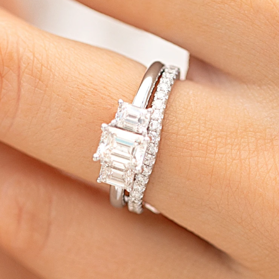 diamond trilogy engagement ring and curved wedding band inw hite gold