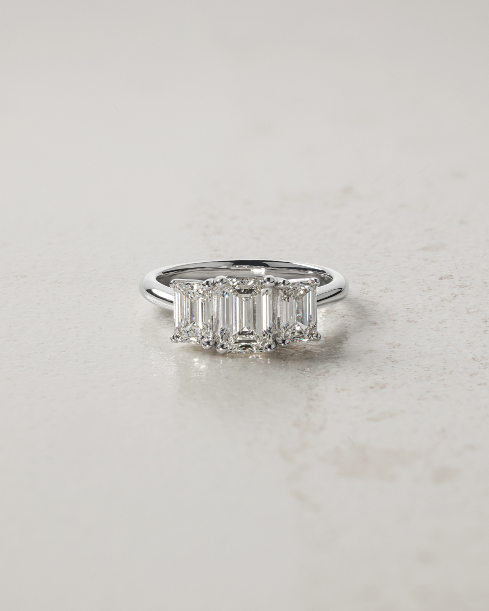 Flatlay of 3 stone engagement ring
