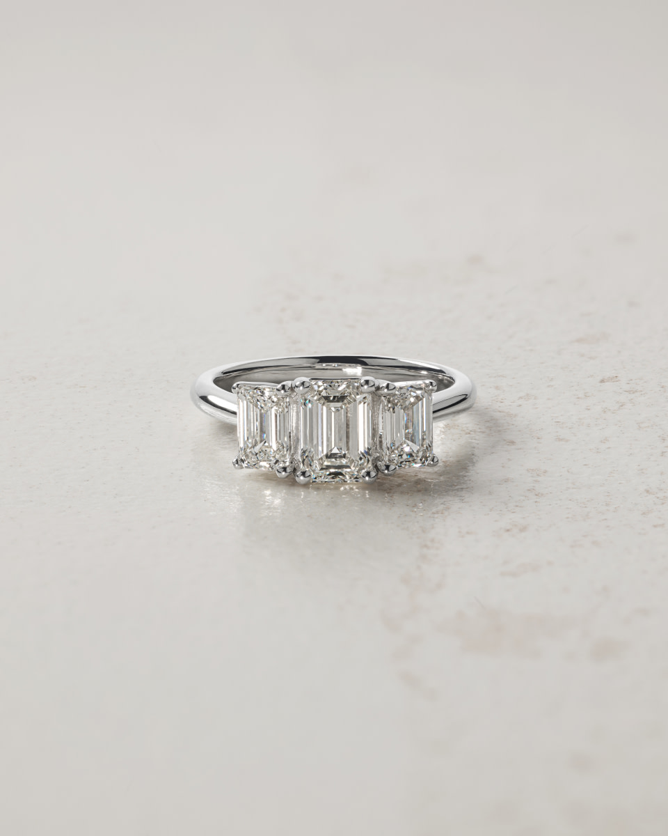 Flatlay of 3 stone engagement ring