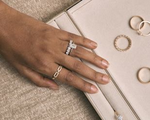 Engagement Rings being tried on