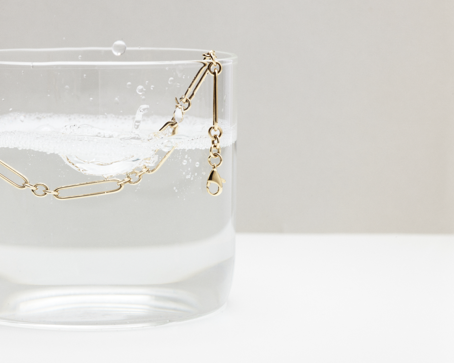 gold hoop and huggie earrings flatlay