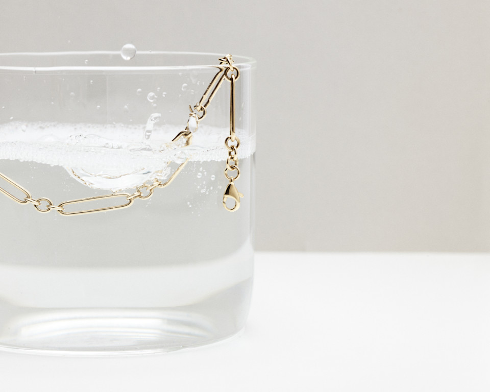 gold hoop and huggie earrings flatlay