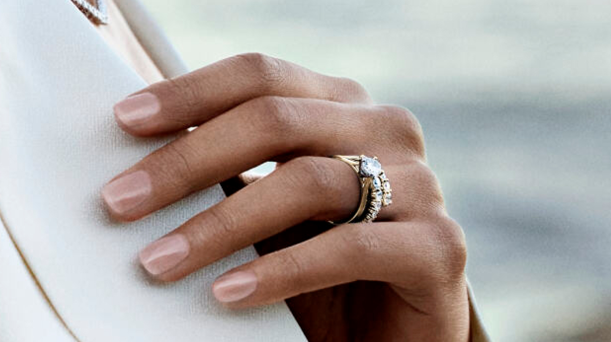  Black & White image of a bride wearing engagement and wedding bands