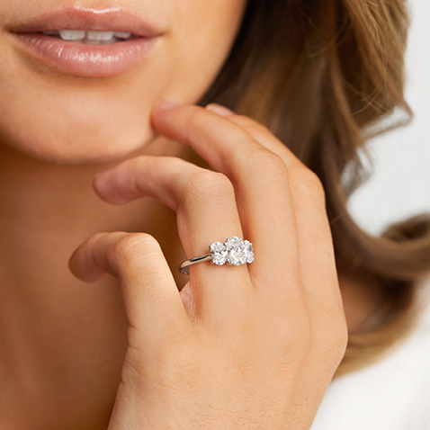Woman wearing three stone Fenix ring