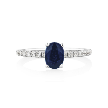 oval blue sapphire engagement ring in white gold