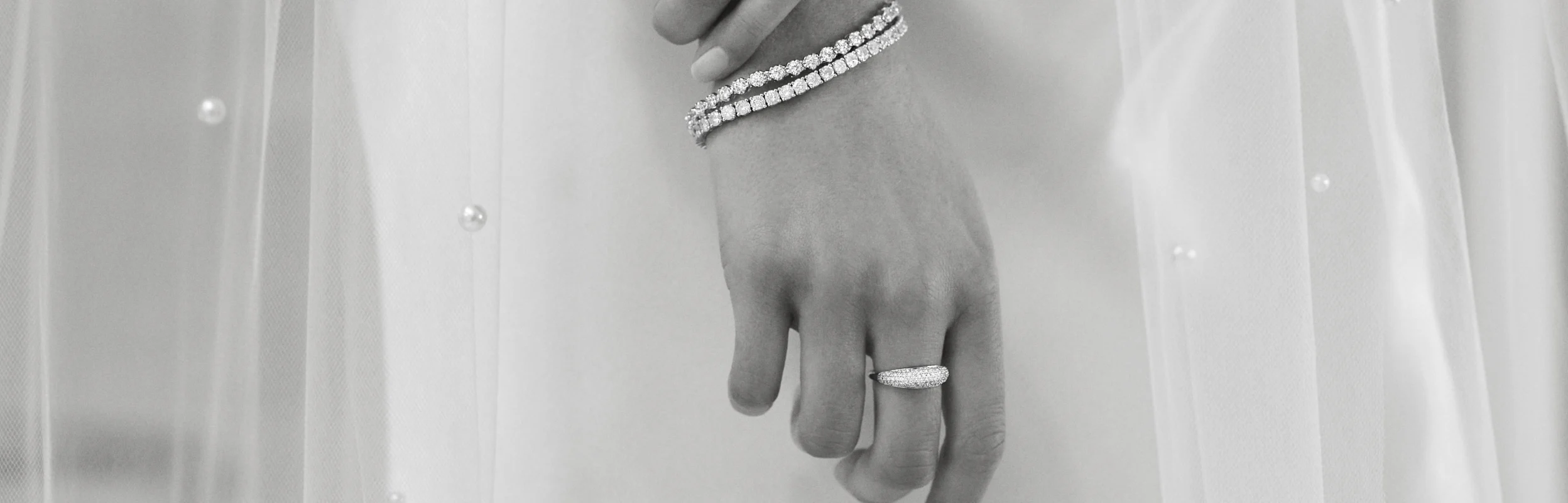 woman wearing diamond ring and tennis bracelet michael hill australia