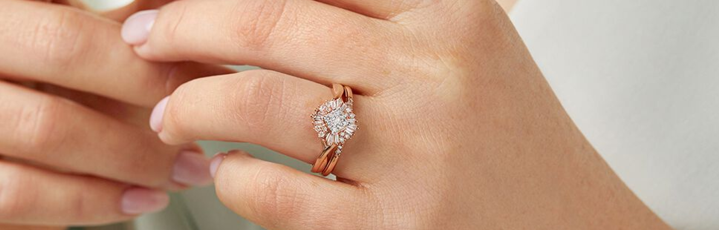 unique diamond cluster with baguette halo engagement ring in rose gold