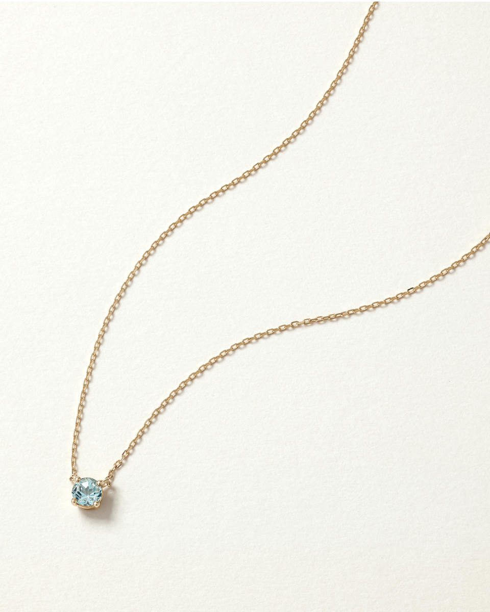 aquamarine birthstone necklace in yellow gold