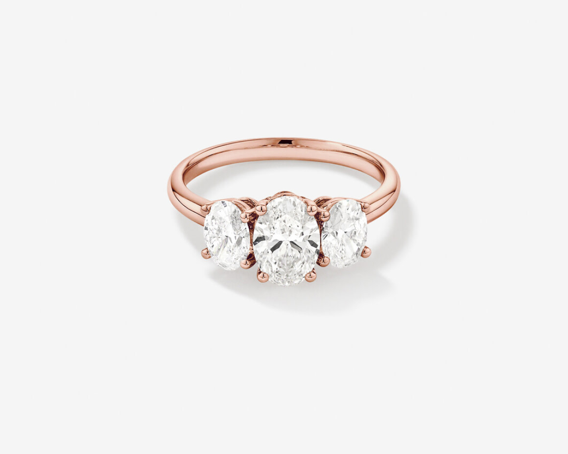 oval cut diamond solitaire engagement ring in yellow gold