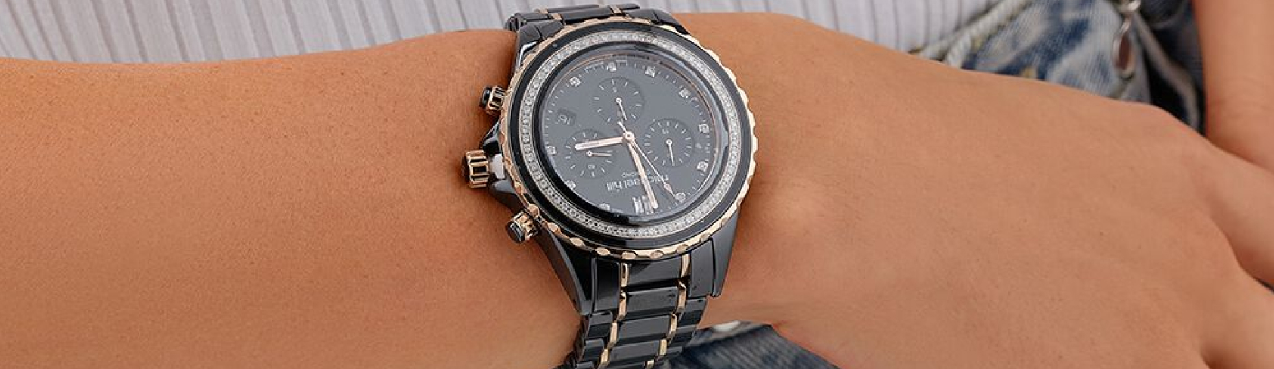 Woman wearing black ceramic watch
