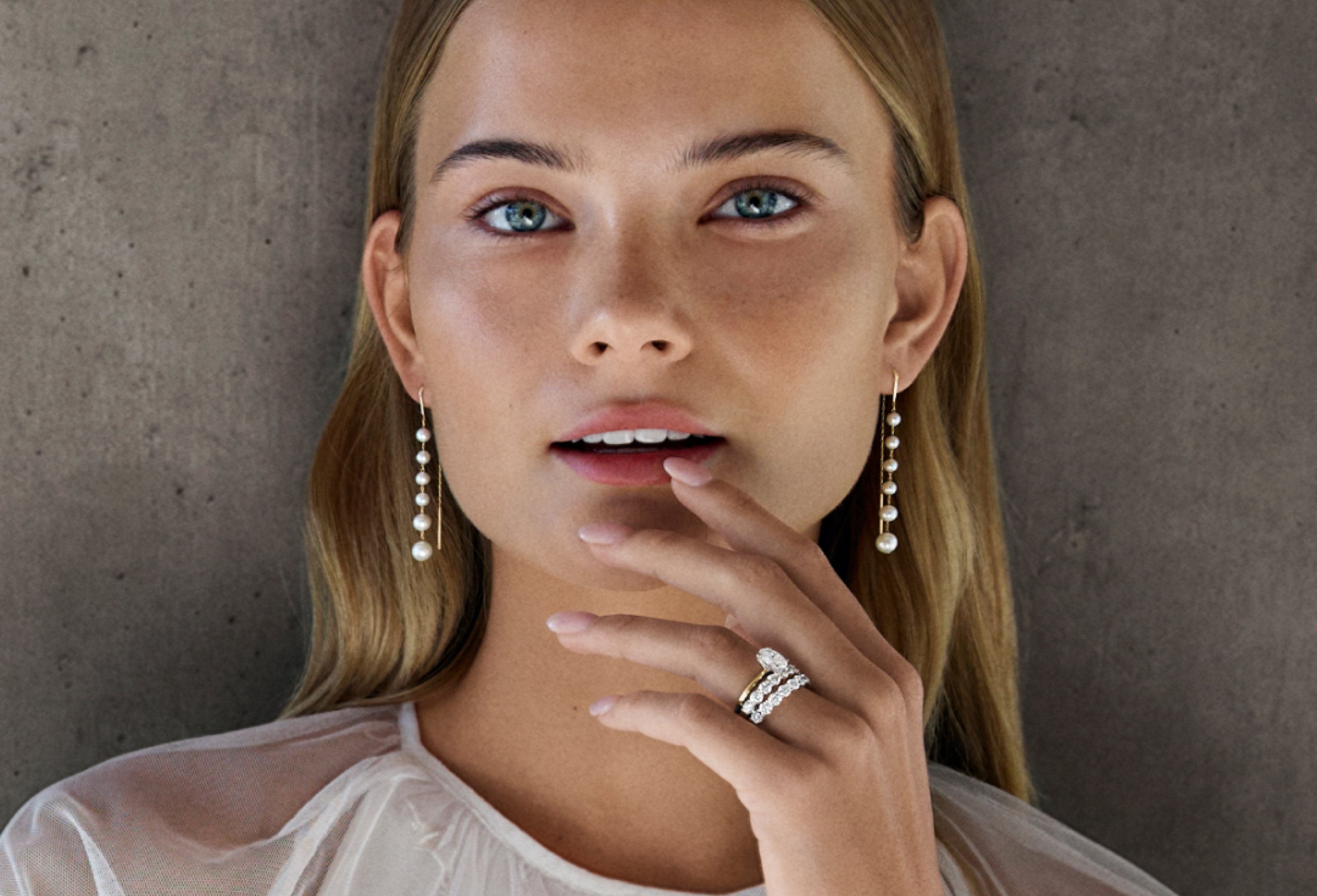 Woman wearing wedding day jewellery