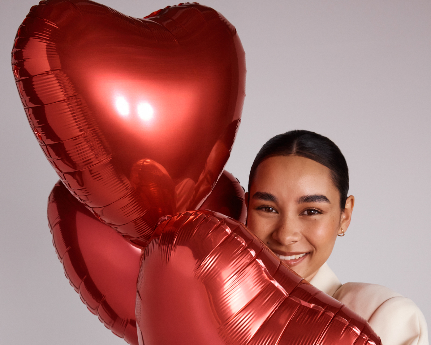 red heart balloons with michael hill model