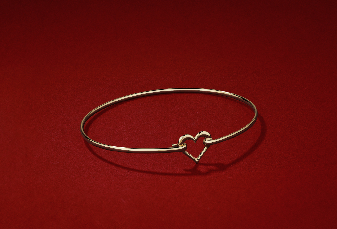 Gold heart bangle