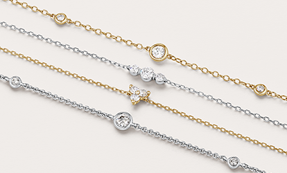 gold and white gold diamond bracelets 